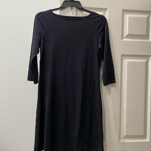 3/4 sleeve black dress. No brand and no size. It can fit a Medium or Large